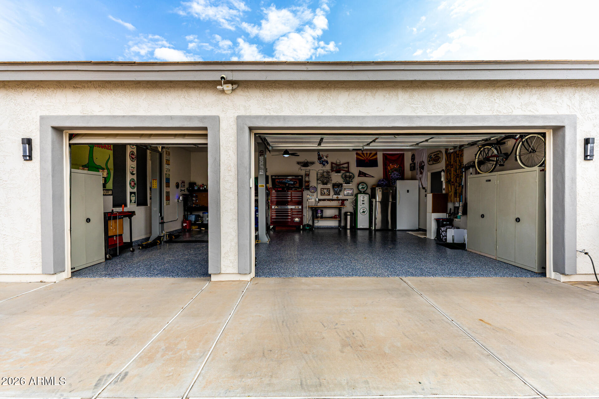 22909 West Sierra Ridge Way Wittmann, AZ 85361 - Photo 56 of 108 3 CAR GARAGE WITH LIFT