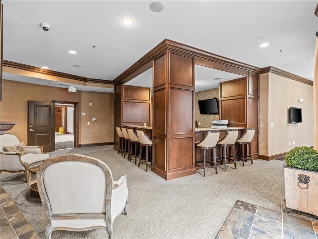 901 Abernathy Road Northeast, Unit 3200 Atlanta, GA 30328 - Photo 11 of 17 a very nice looking dining room with chairs