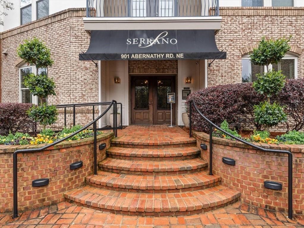 901 Abernathy Road Northeast, Unit 3200 Atlanta, GA 30328 - Photo 17 of 17 a view of a house with potted plants and more windows