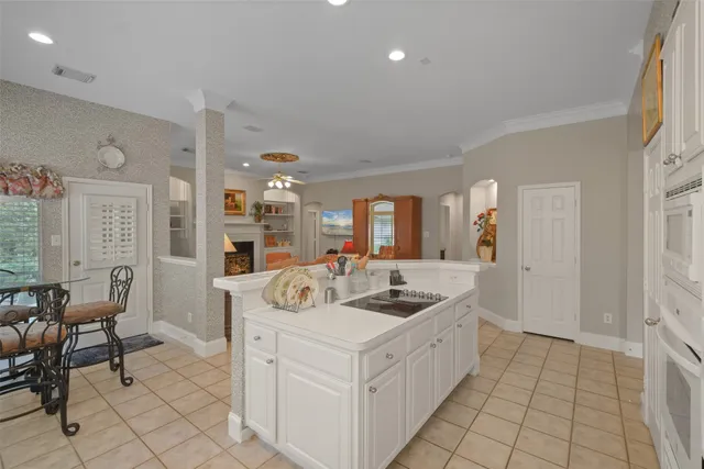 a kitchen with stainless steel appliances granite countertop a sink and cabinets