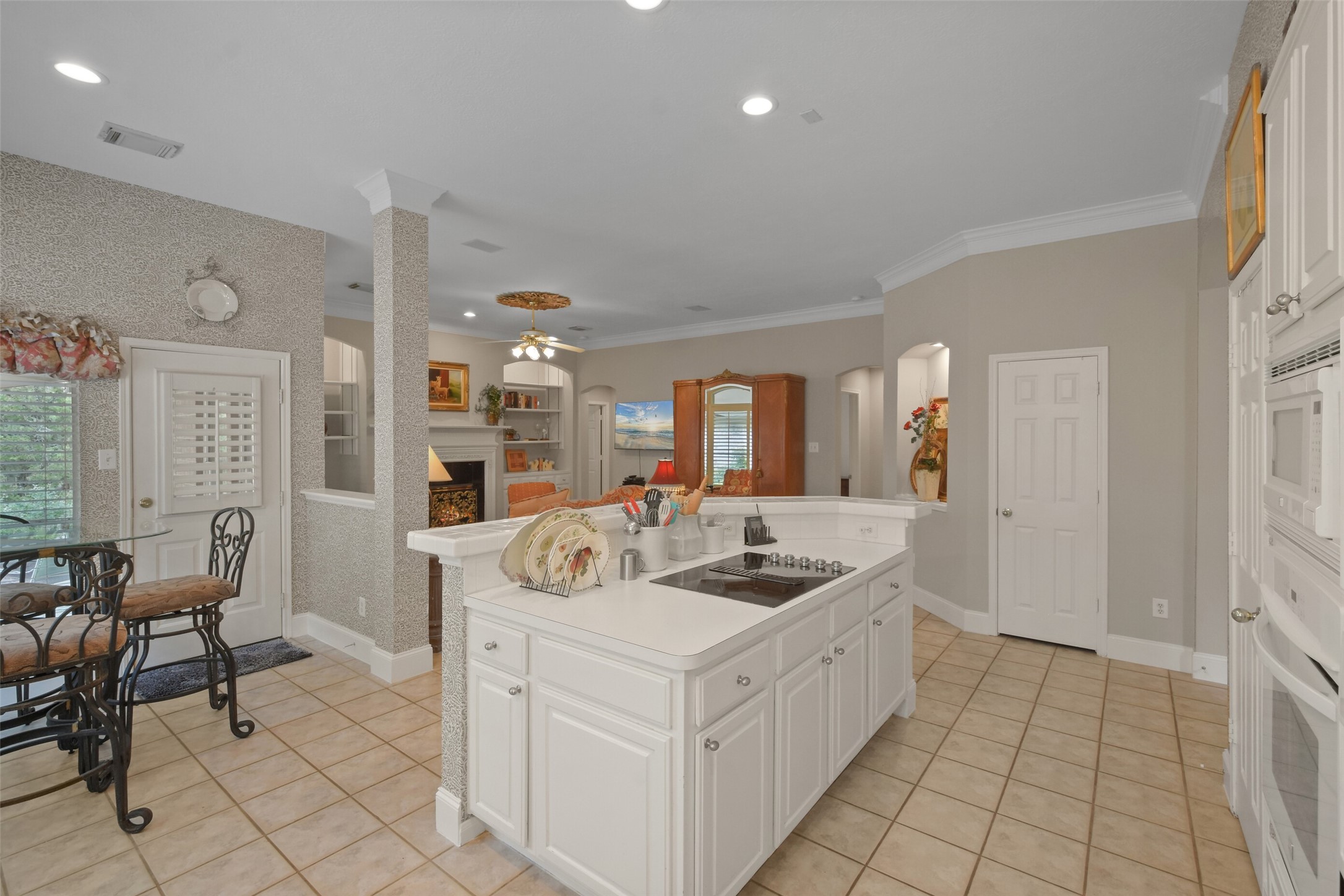 18 Pinery Ridge Place Spring, TX 77382 - Photo 16 of 38 a kitchen with stainless steel appliances granite countertop a sink and cabinets