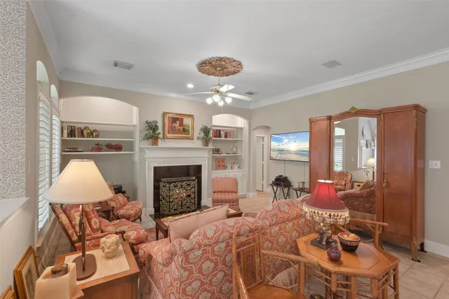 a view of a livingroom with furniture and a fireplace