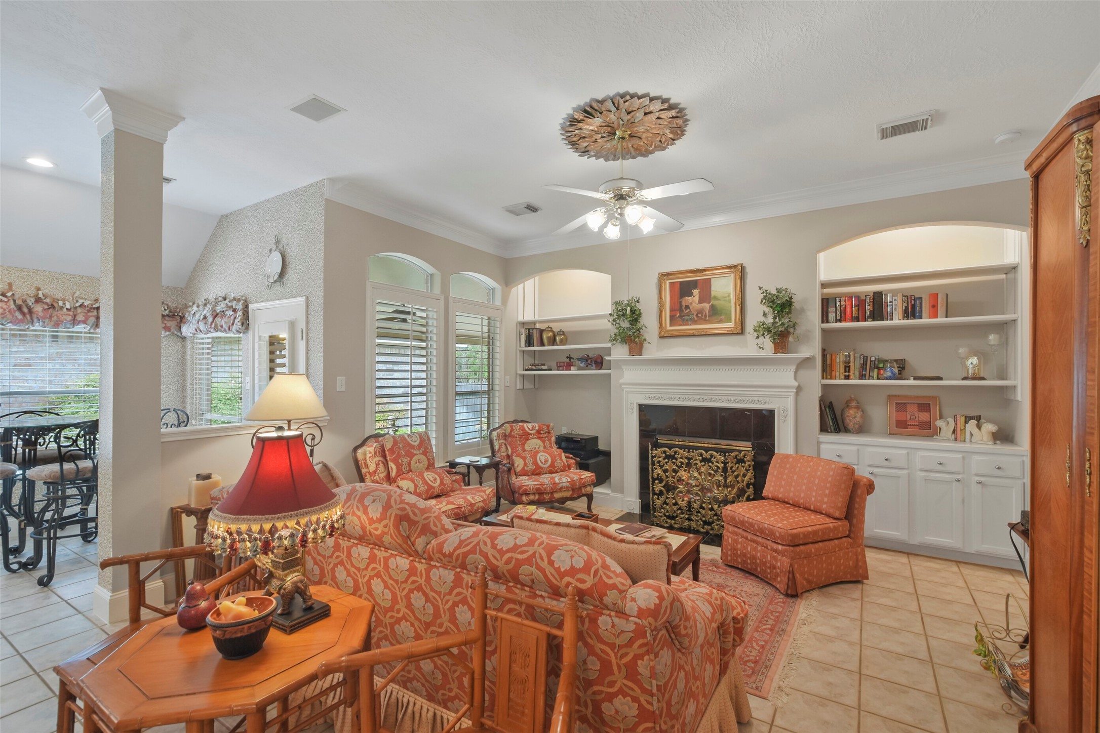 18 Pinery Ridge Place Spring, TX 77382 - Photo 21 of 38 a living room with furniture fireplace and window
