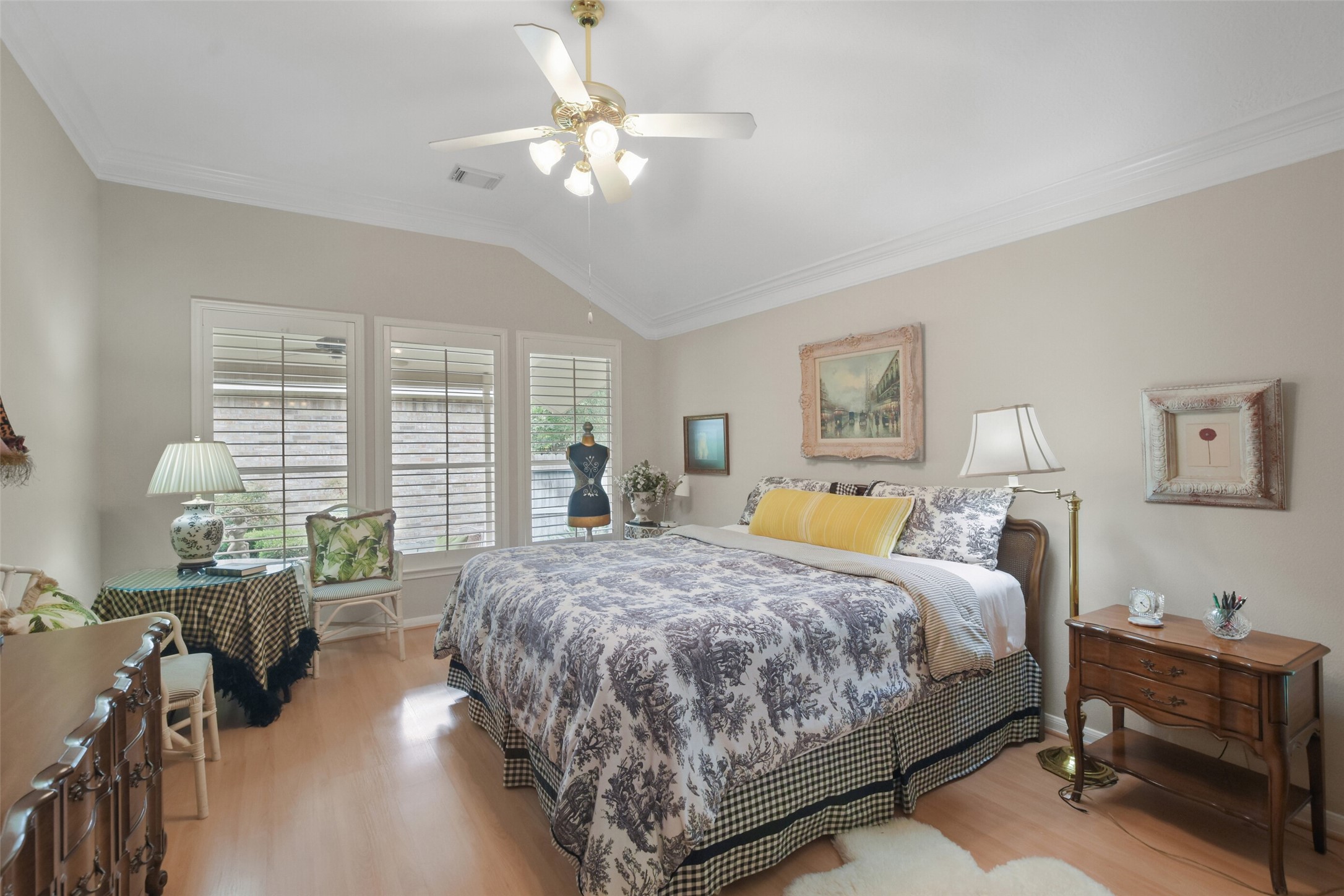 18 Pinery Ridge Place Spring, TX 77382 - Photo 24 of 38 a bedroom with a large bed and a chandelier