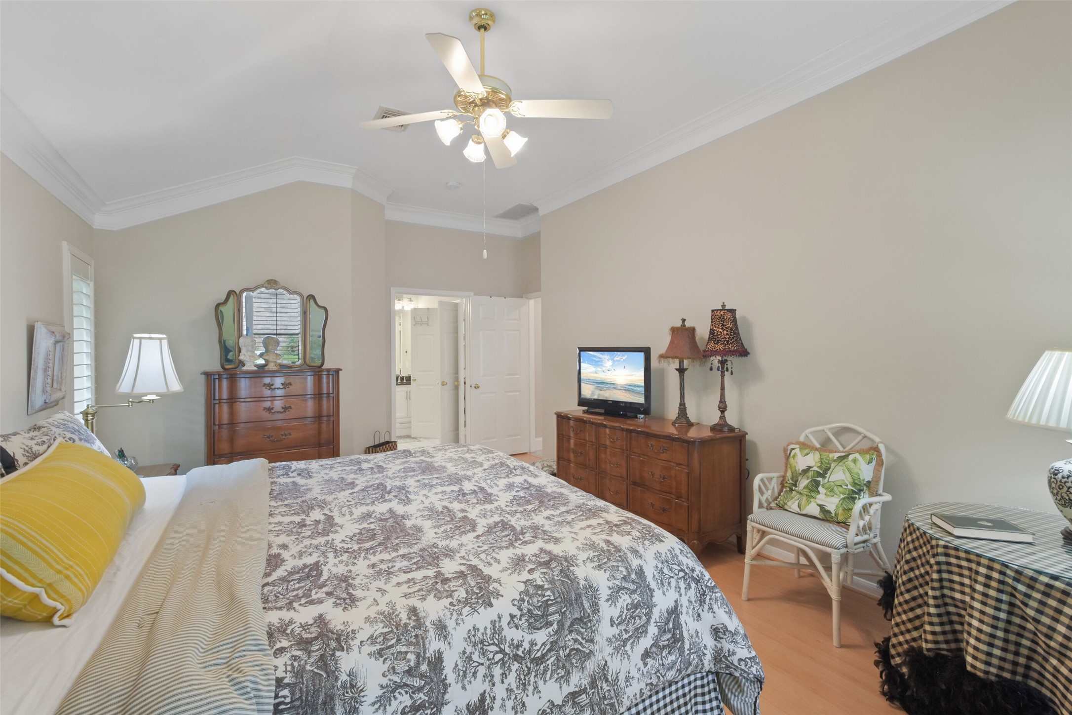 18 Pinery Ridge Place Spring, TX 77382 - Photo 26 of 38 a bedroom with a bed and dresser with mirror