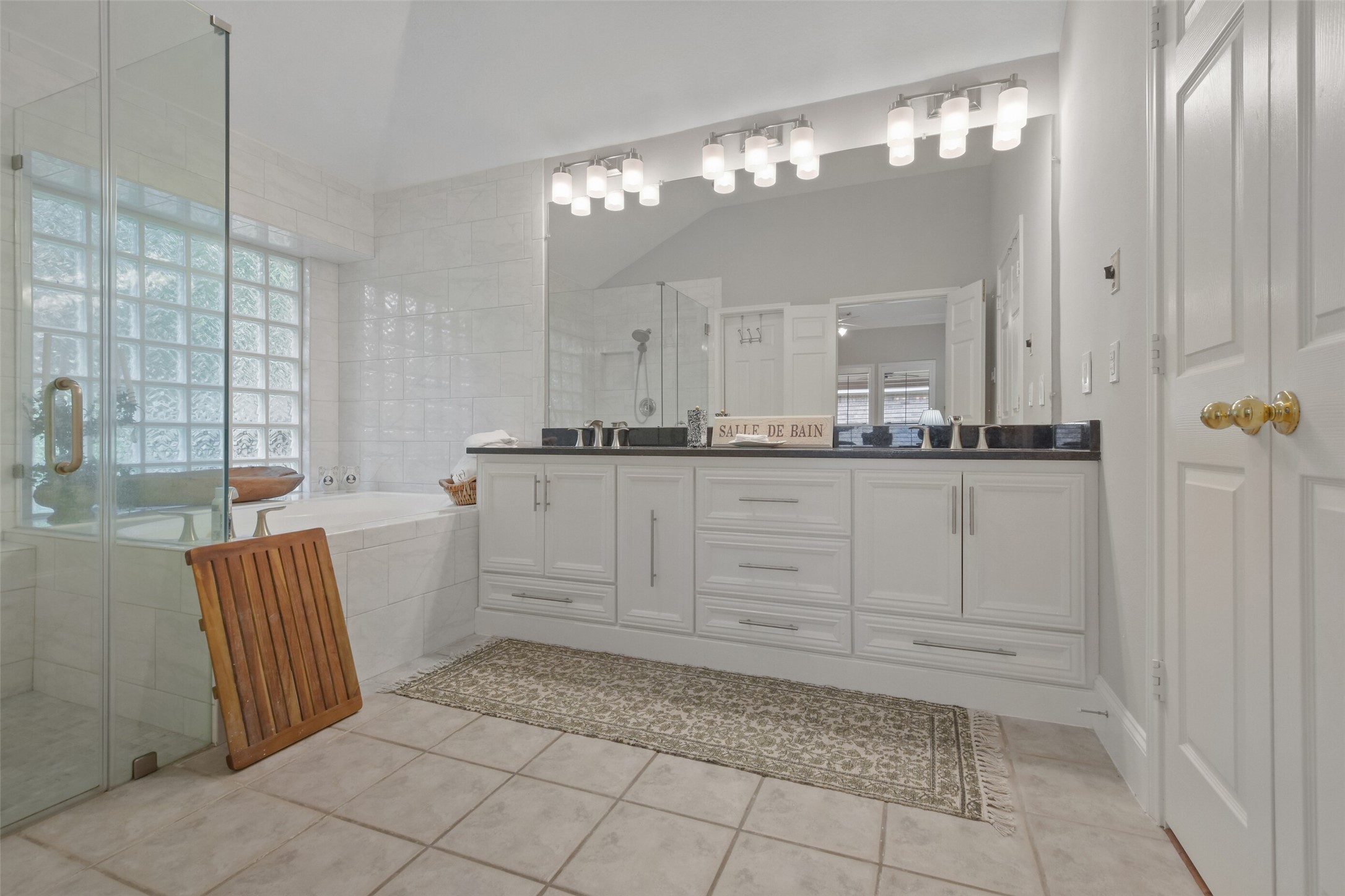 18 Pinery Ridge Place Spring, TX 77382 - Photo 27 of 38 a bathroom with a sink a vanity and a mirror