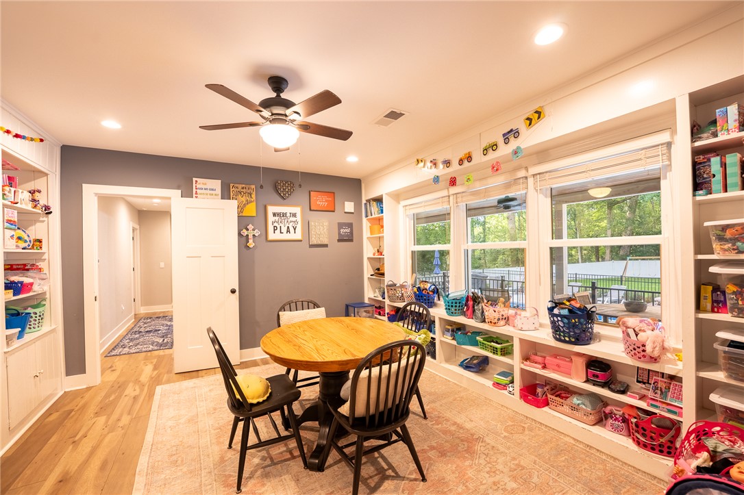 103 Riggs Drive Clemson, SC 29631 - Photo 21 of 50 A well-lit play space with built-in shelving offers ample room for imagination and activities.