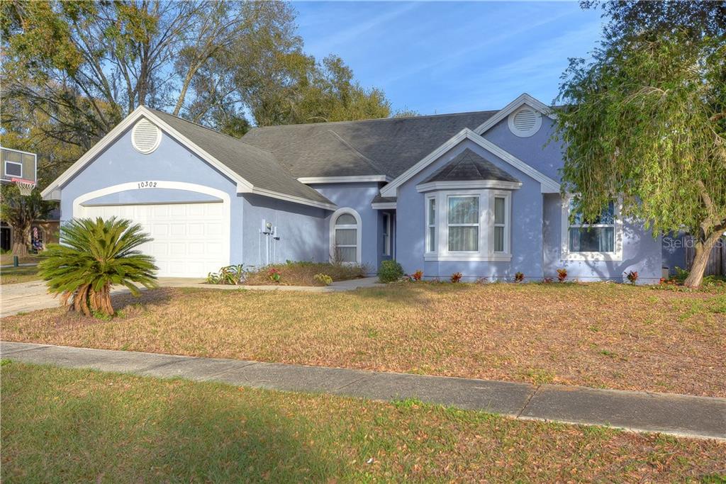 Location, location, location! This stunning move-in ready pool home is nestled on a large 0.28 acre corner lot in the community of Boyette Springs!