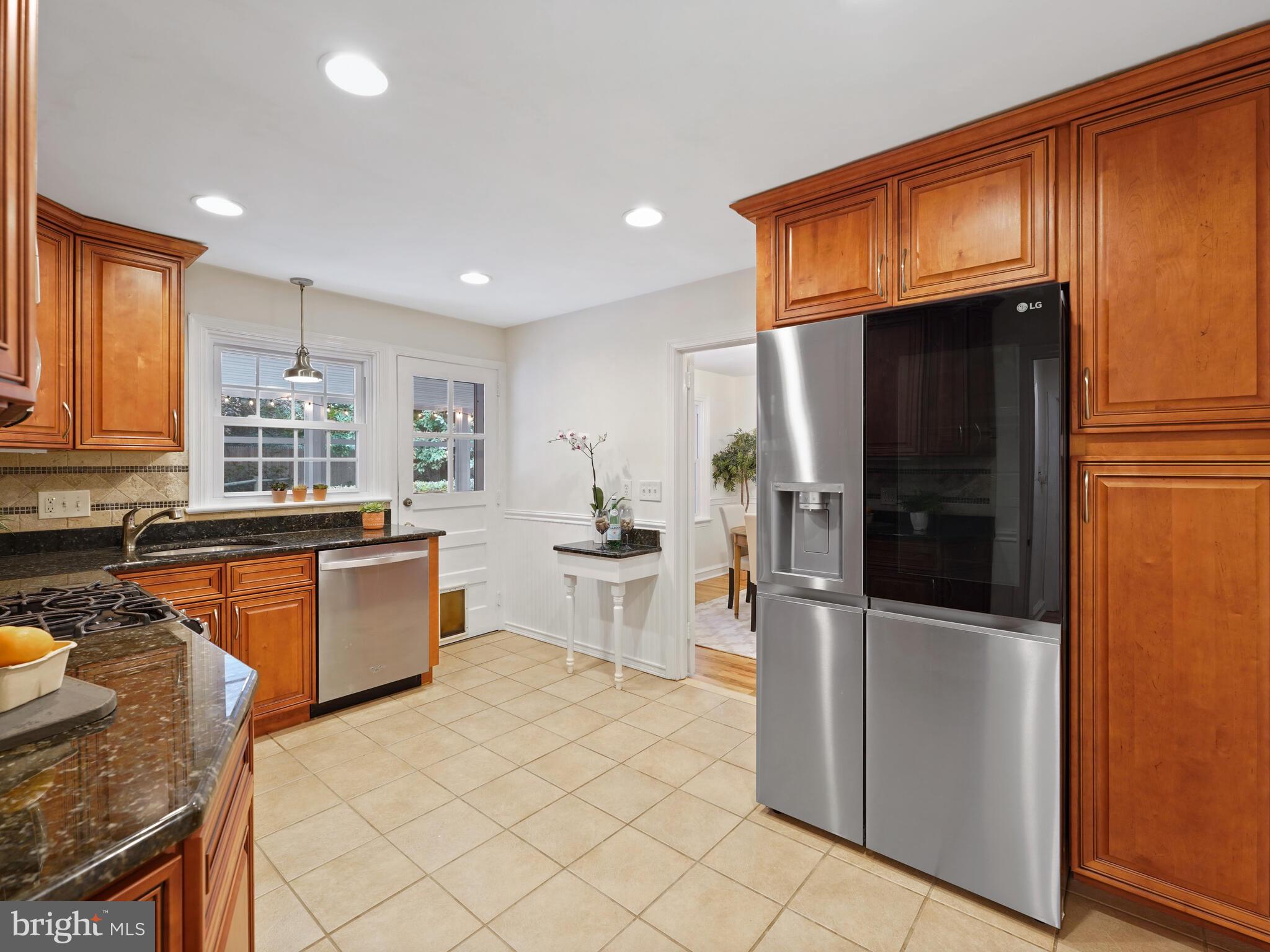 103 Kershaw Road Wallingford, PA 19086 - Photo 17 of 34 Updated with kitchen with brand new LG fridge
