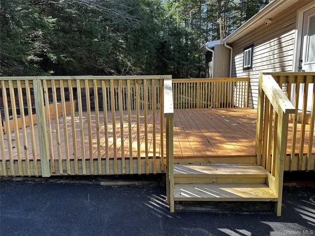 a view of a porch with a yard