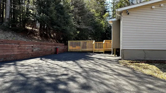 a view of backyard with deck