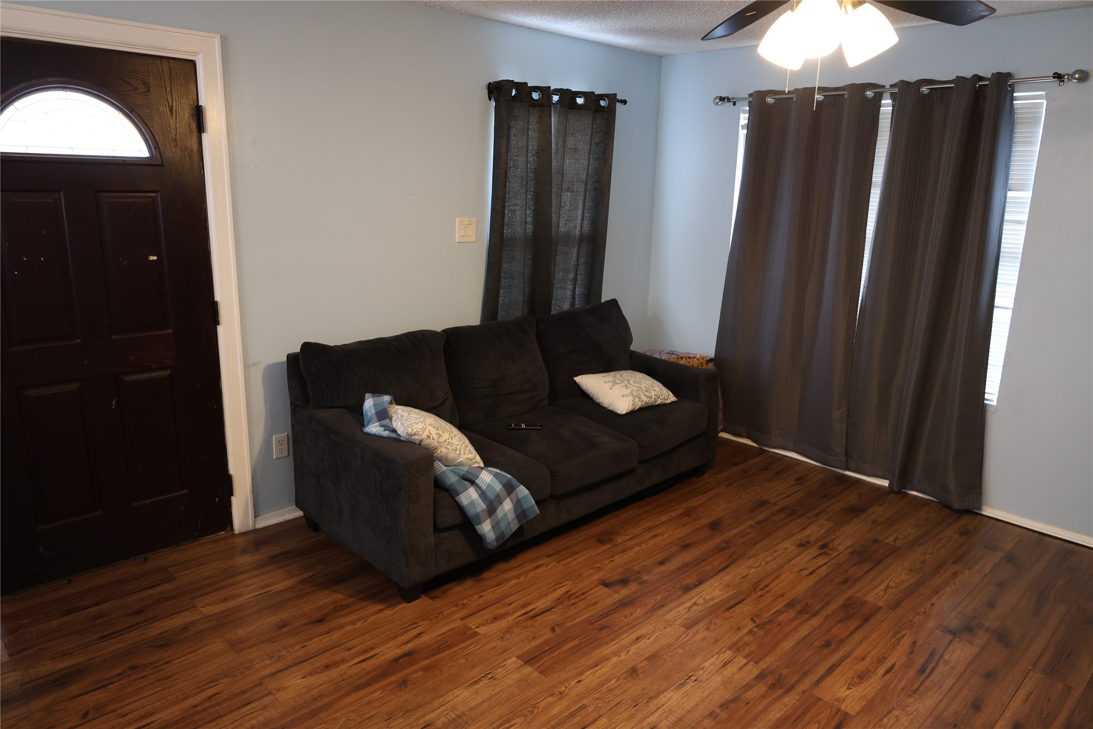 1009 Caplin Street Houston, TX 77022 - Photo 15 of 24 a living room with wooden floor