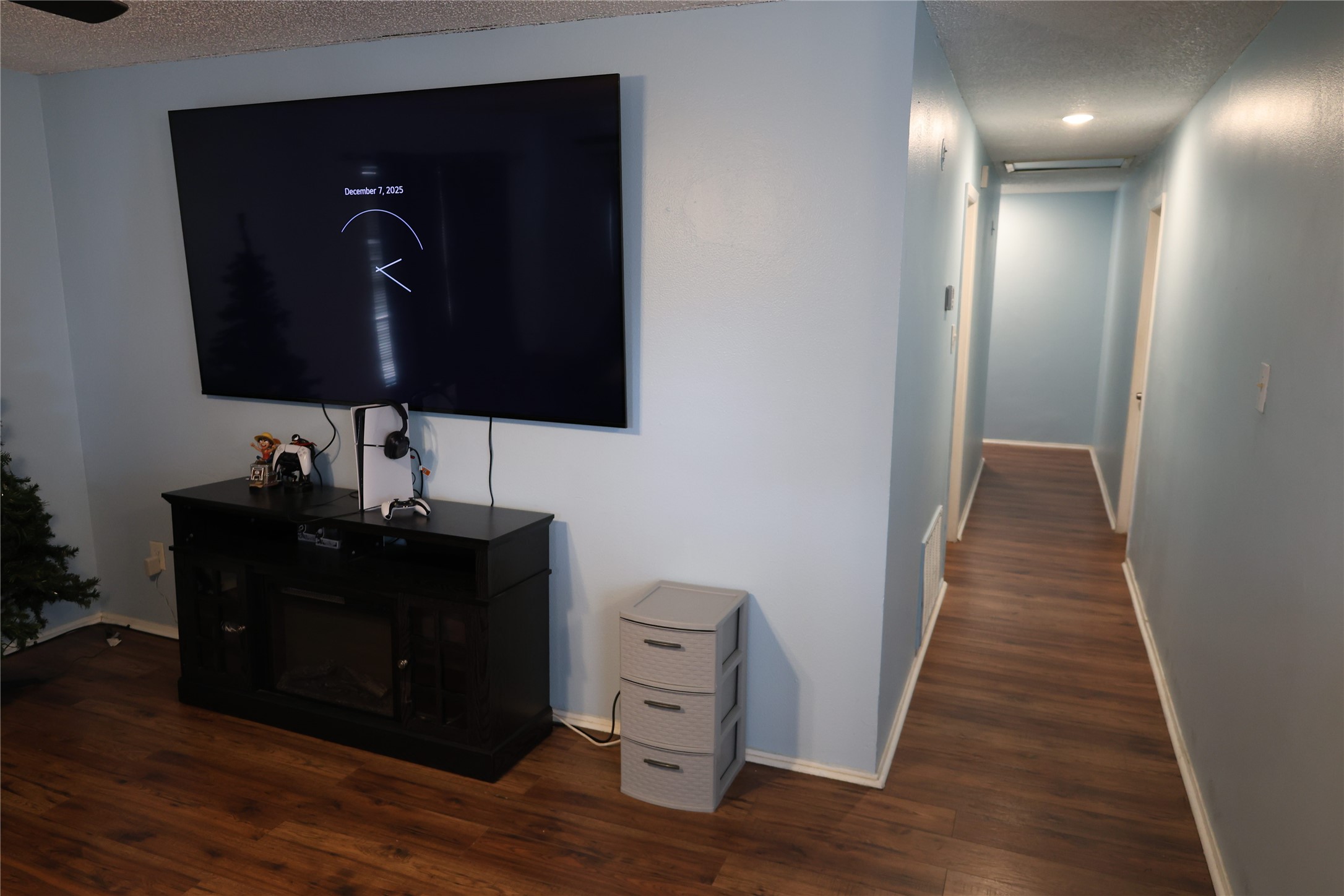 1009 Caplin Street Houston, TX 77022 - Photo 16 of 24 a view of a hallway with wooden floor