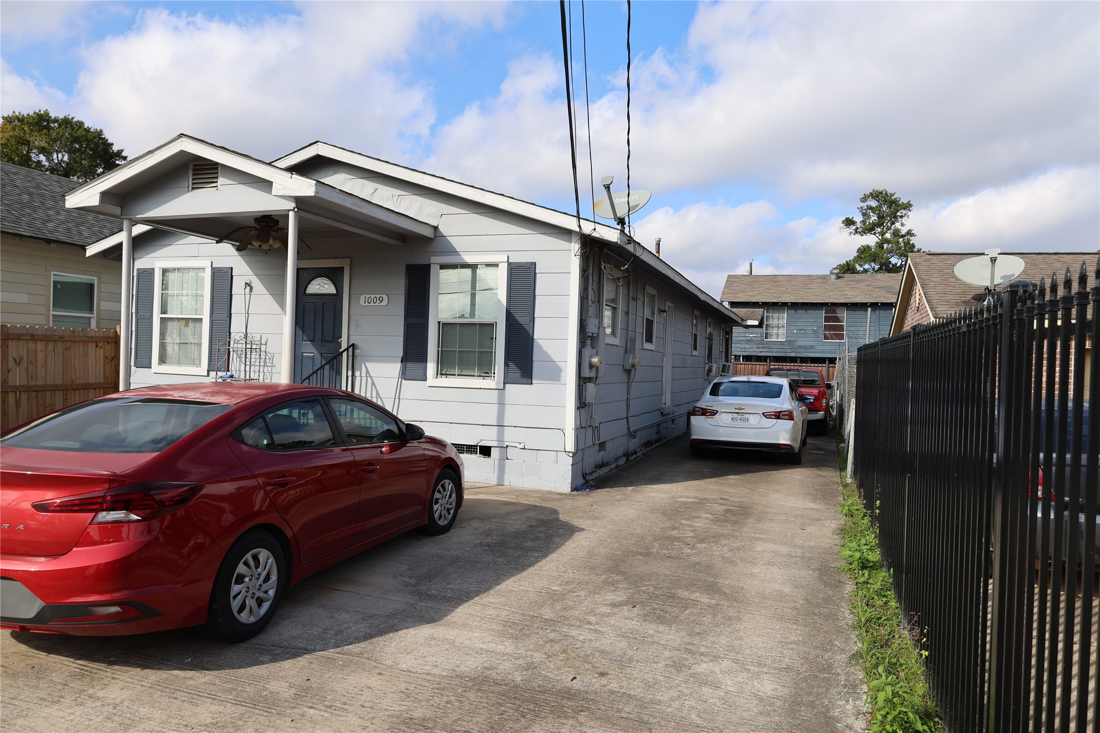 1009 Caplin Street Houston, TX 77022 - Photo 2 of 24 a car parked in front of house