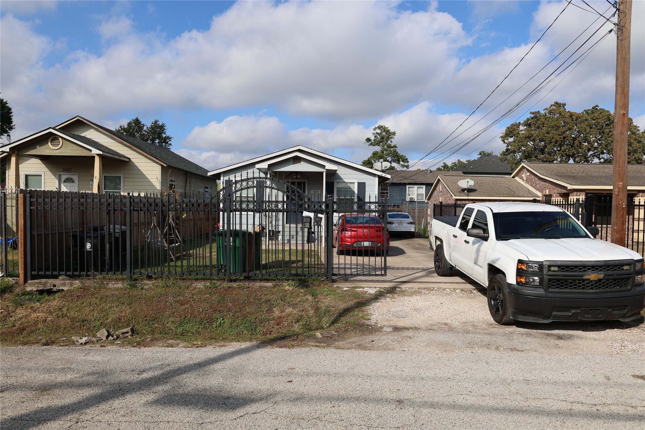 1009 Caplin Street Houston, TX 77022 - Photo 7 of 24 a car parked in front of house