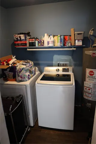 a utility room with dryer and washer
