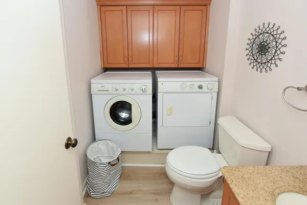 a bathroom with a toilet and a sink