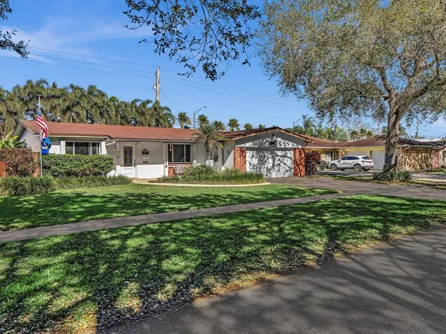 a view of a house with a big yard