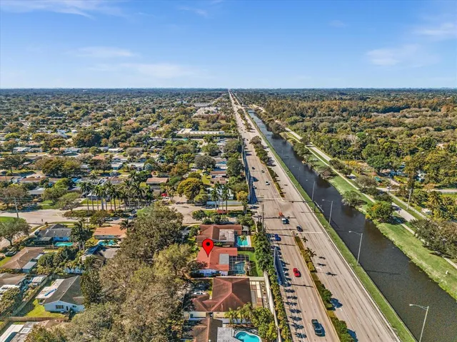 an aerial view of city and lake