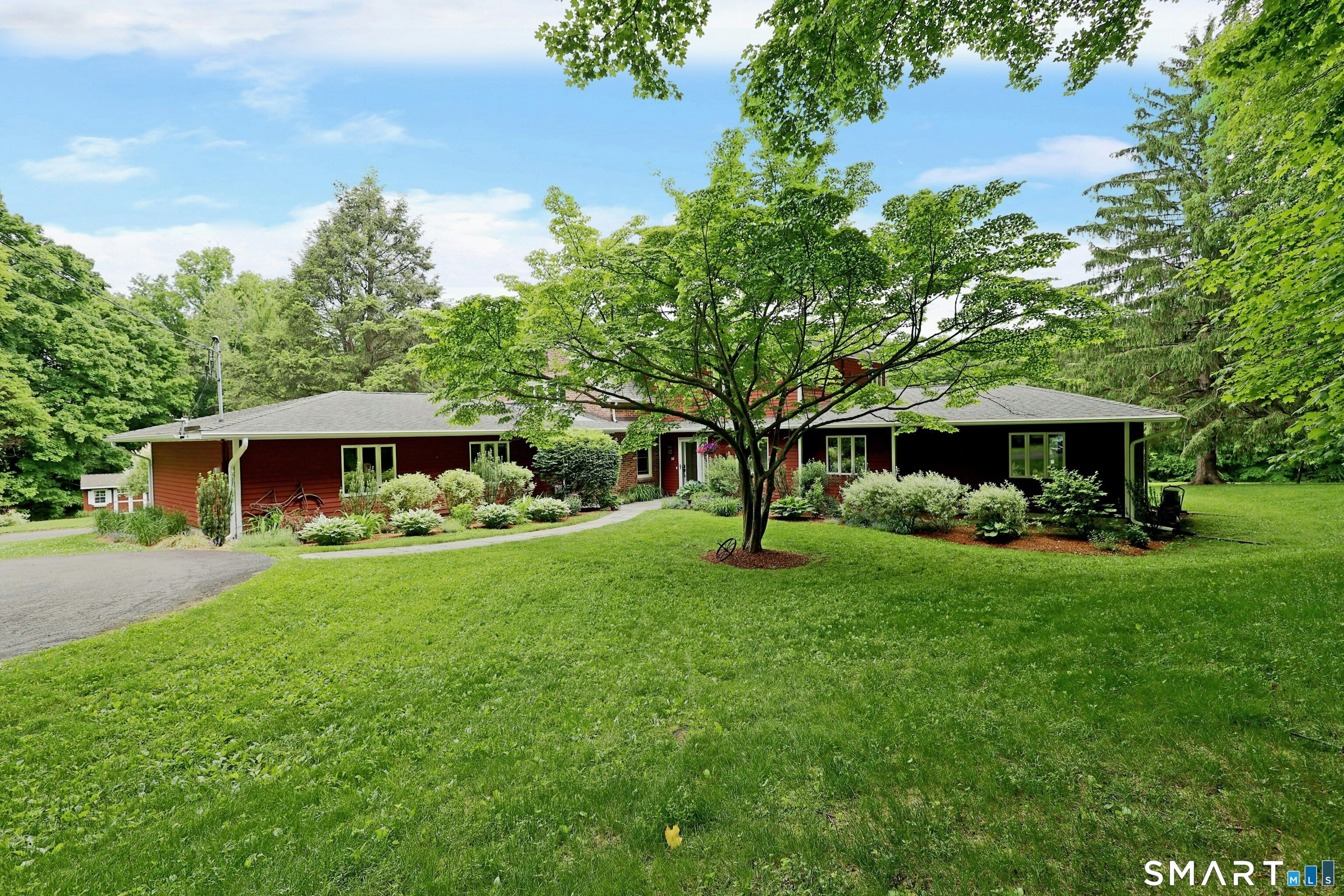 68 Bloomer Road Ridgefield, CT 06877 - Photo 2 of 40 a view of a house with a yard