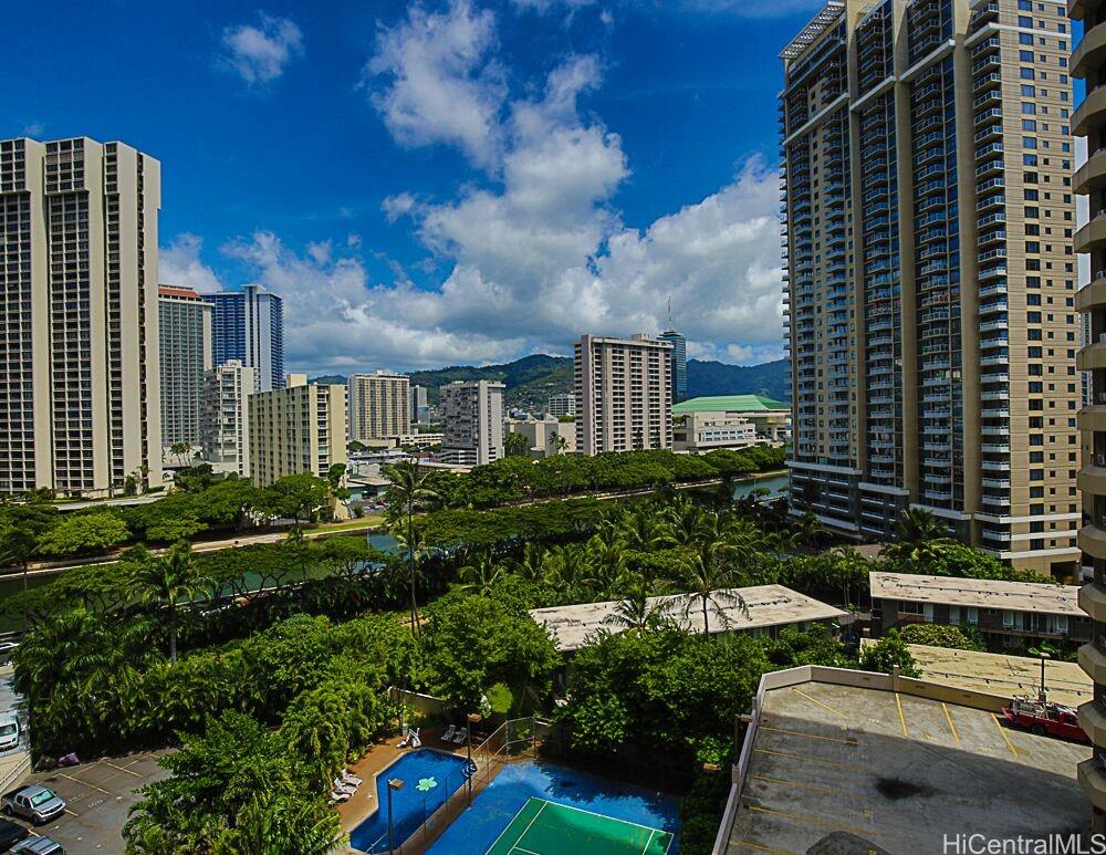 1690 Ala Moana Boulevard, Unit 1105 Honolulu, HI 96815 - Photo 5 of 13 a front view of a house with a yard
