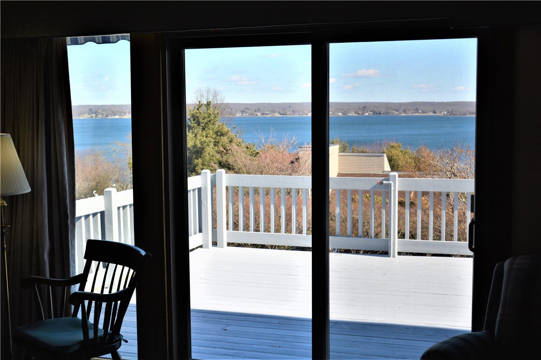 187 Lepes Road Portsmouth, RI 02871 - Photo 7 of 33 Sliders to deck off LR . . . spectacular waterviews!