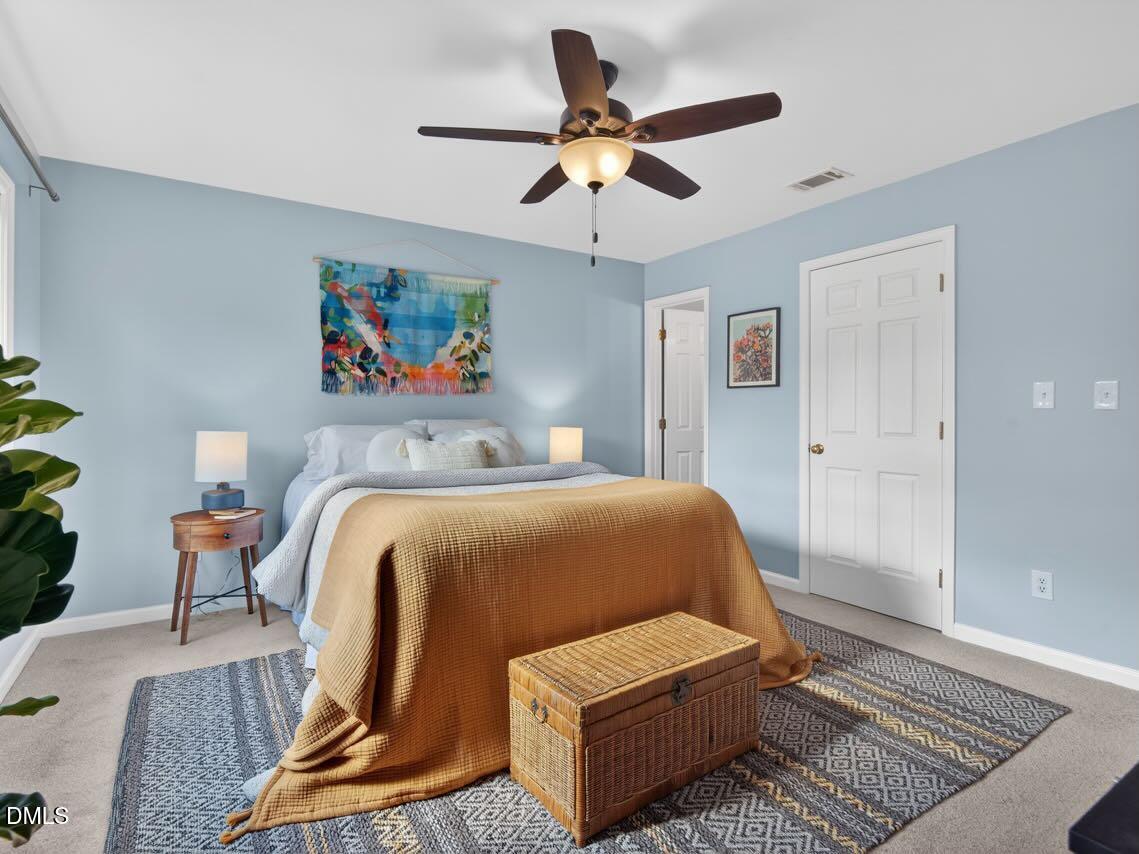 212 Old Fox Trail Durham, NC 27713 - Photo 19 of 35 a bedroom with furniture and a rug