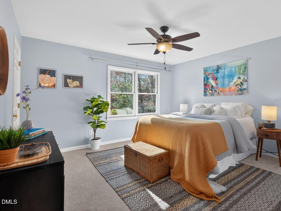 212 Old Fox Trail Durham, NC 27713 - Photo 20 of 35 a bed sitting in a bedroom next to a window