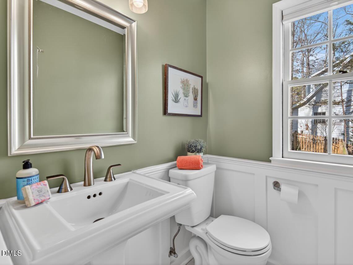 212 Old Fox Trail Durham, NC 27713 - Photo 28 of 35 a bathroom with a sink mirror and toilet
