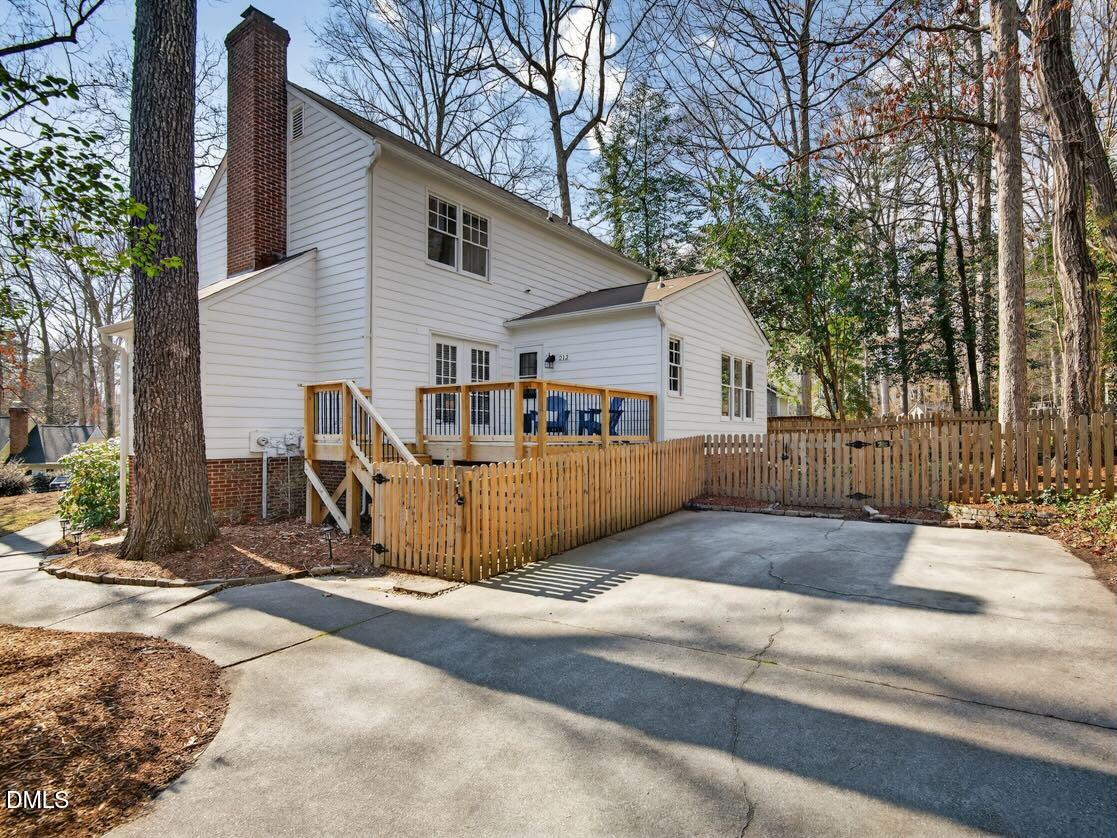 212 Old Fox Trail Durham, NC 27713 - Photo 31 of 35 a view of a house with backyard and trees