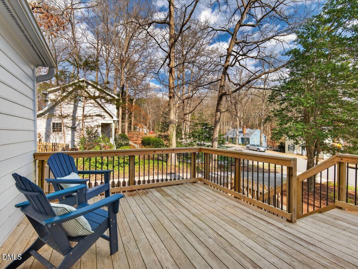 212 Old Fox Trail Durham, NC 27713 - Photo 32 of 35 a view of a wooden chairs on deck with wooden floor and fence