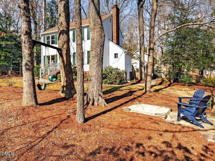 212 Old Fox Trail Durham, NC 27713 - Photo 34 of 35 a view of a house with backyard and sitting area