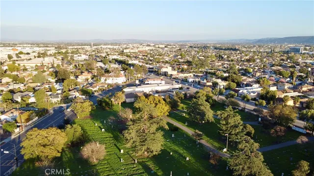 an aerial view of residential building and trees