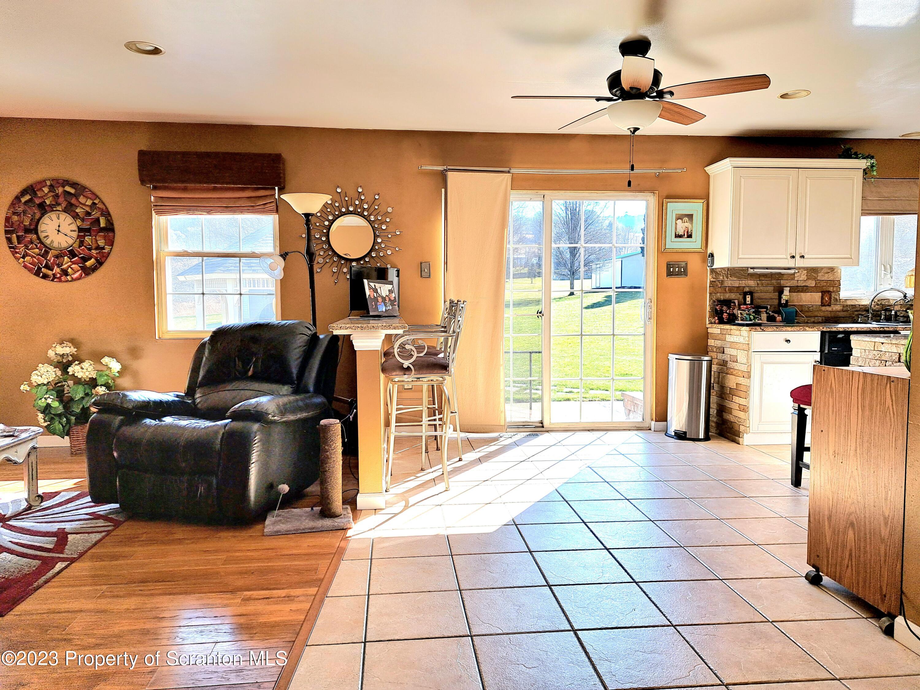 987 Chase Road Shavertown, PA 18708 - Photo 17 of 70 a living room with furniture and a flat screen tv