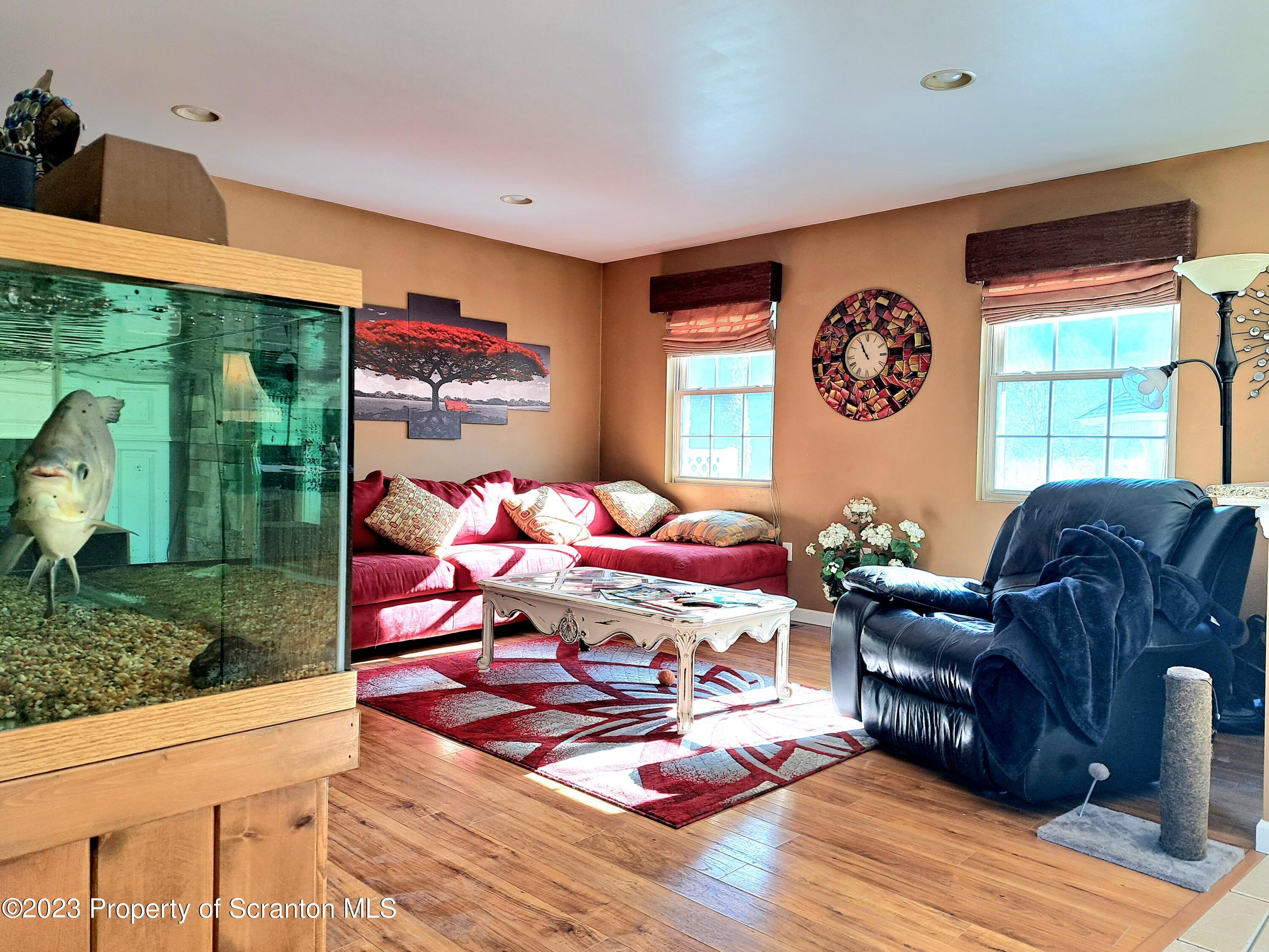 987 Chase Road Shavertown, PA 18708 - Photo 20 of 70 a living room with furniture and a window