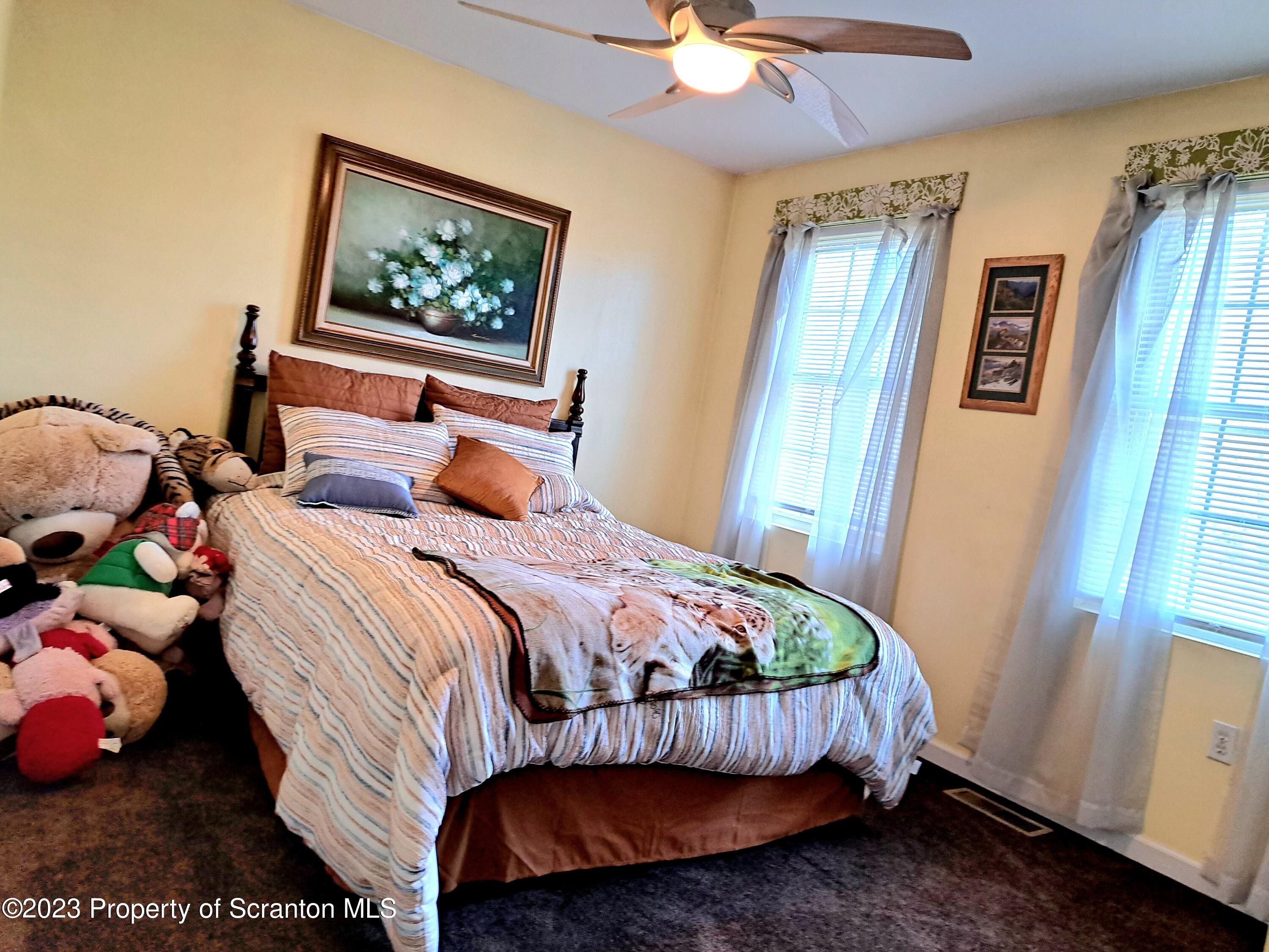 987 Chase Road Shavertown, PA 18708 - Photo 50 of 70 a bedroom with a bed and a window