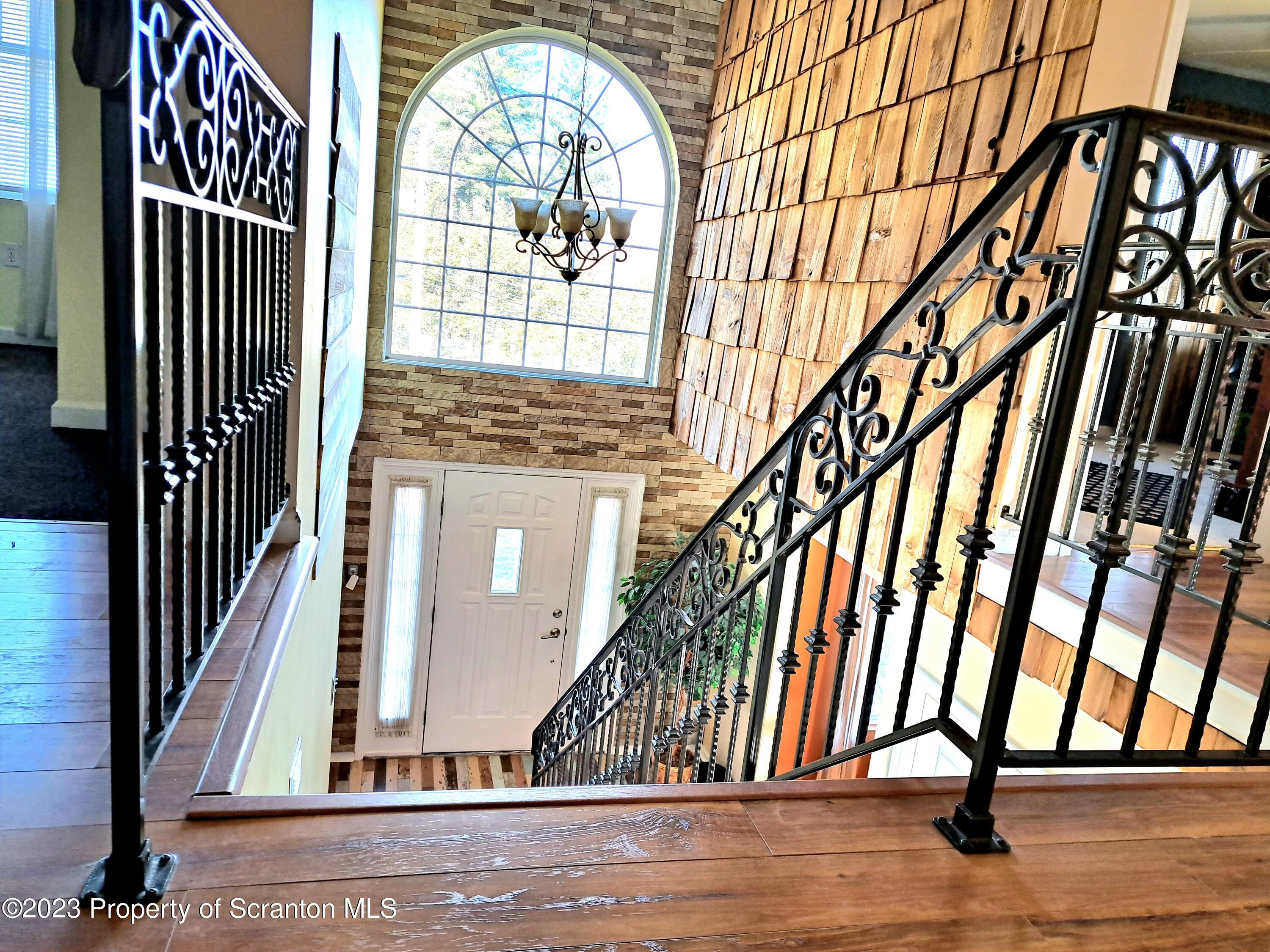 987 Chase Road Shavertown, PA 18708 - Photo 6 of 70 a view of an entryway with wooden floor