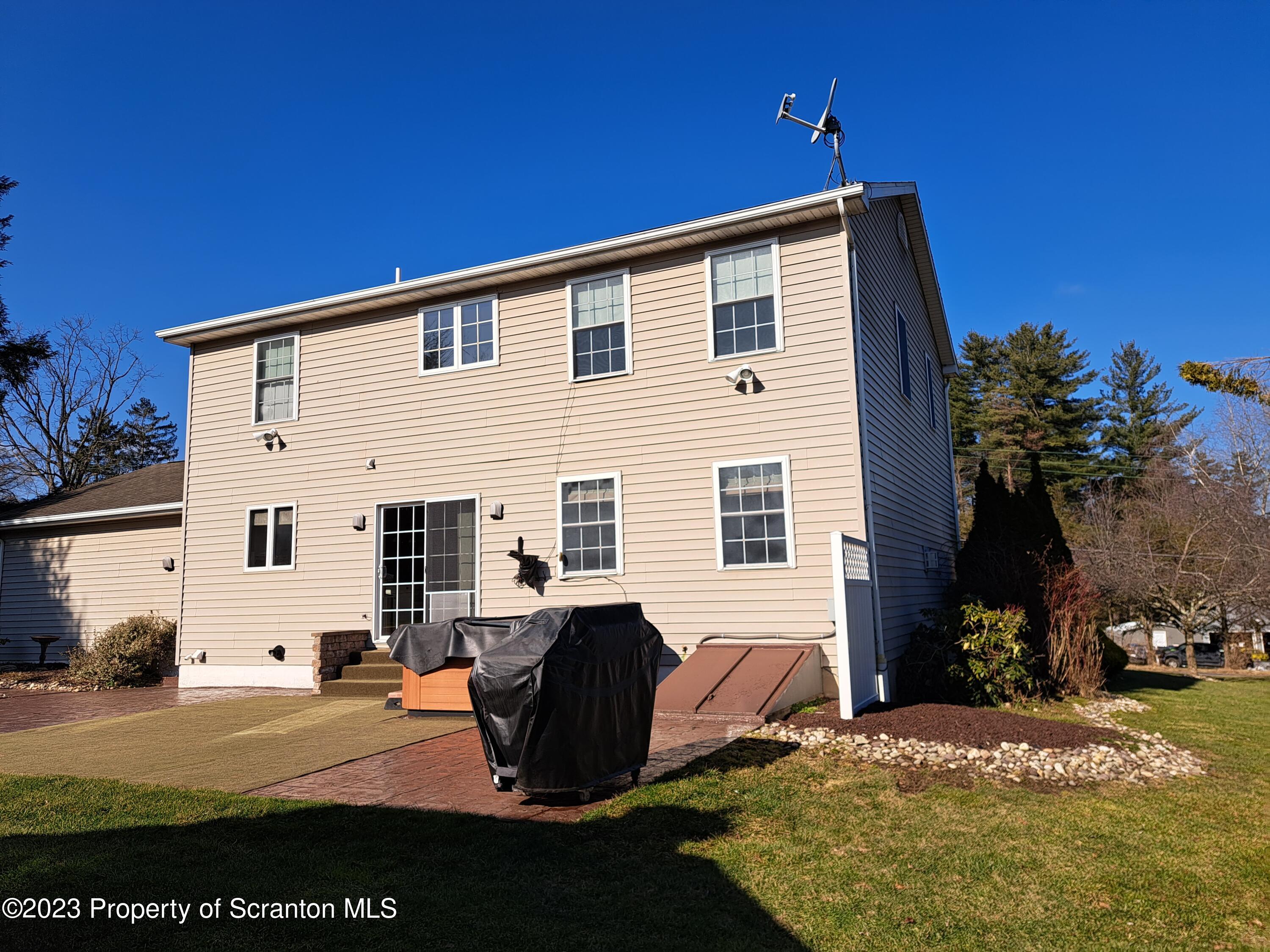 987 Chase Road Shavertown, PA 18708 - Photo 63 of 70 a view of a house with backyard and a tree