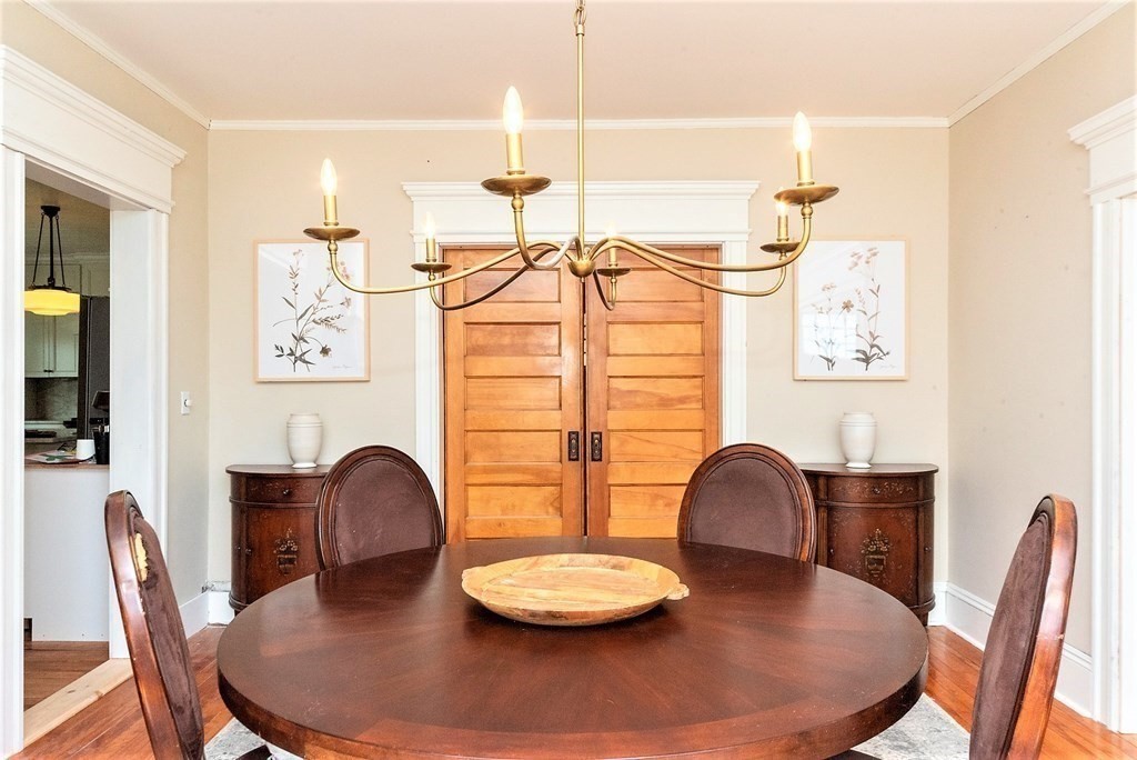 265 Water Street Clinton, MA 01510 - Photo 11 of 30 a dining room with furniture and wooden floor