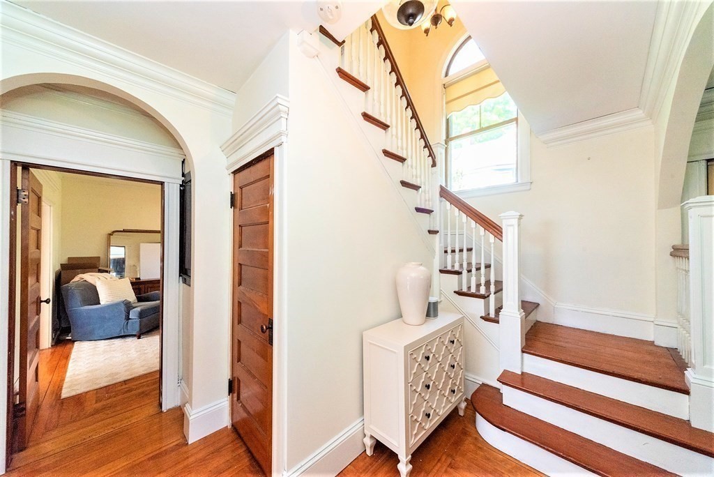 265 Water Street Clinton, MA 01510 - Photo 14 of 30 a view of entryway with wooden floor and windows