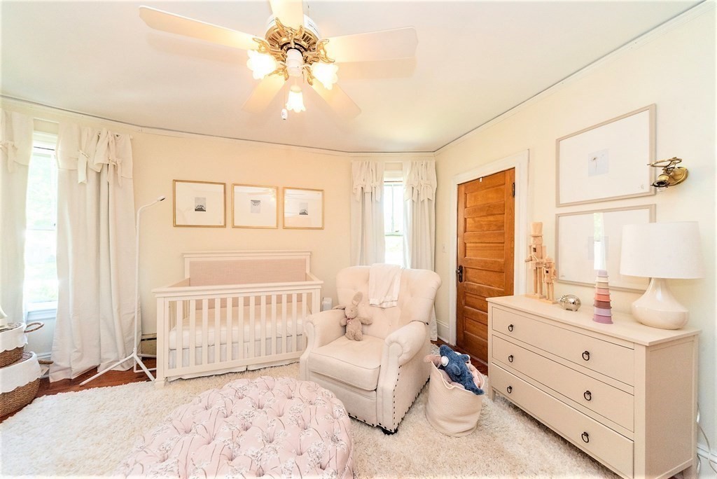 265 Water Street Clinton, MA 01510 - Photo 17 of 30 a bedroom with a bed and a window