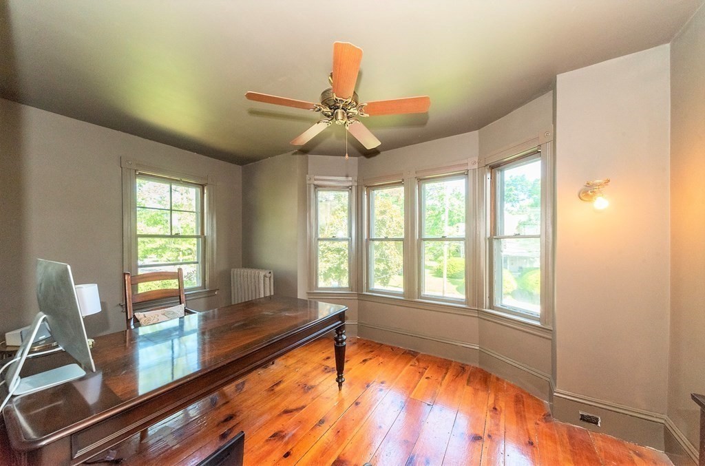 265 Water Street Clinton, MA 01510 - Photo 20 of 30 a living room with a large window