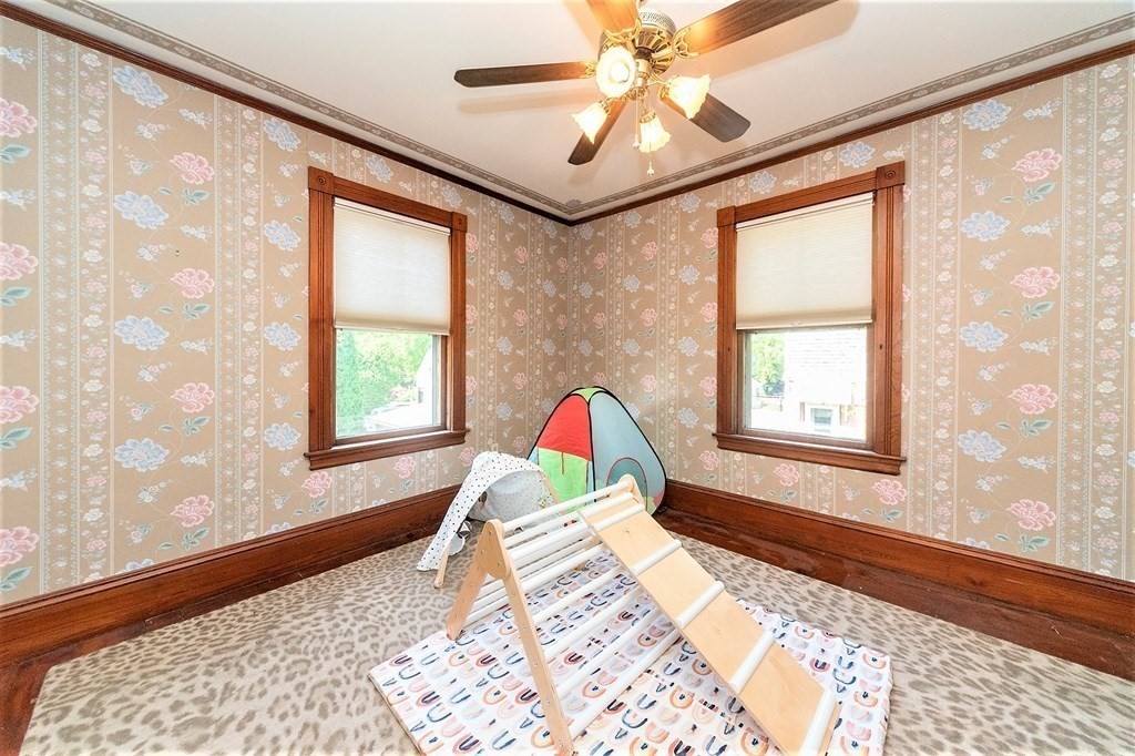 265 Water Street Clinton, MA 01510 - Photo 21 of 30 a bedroom with a bed and a window