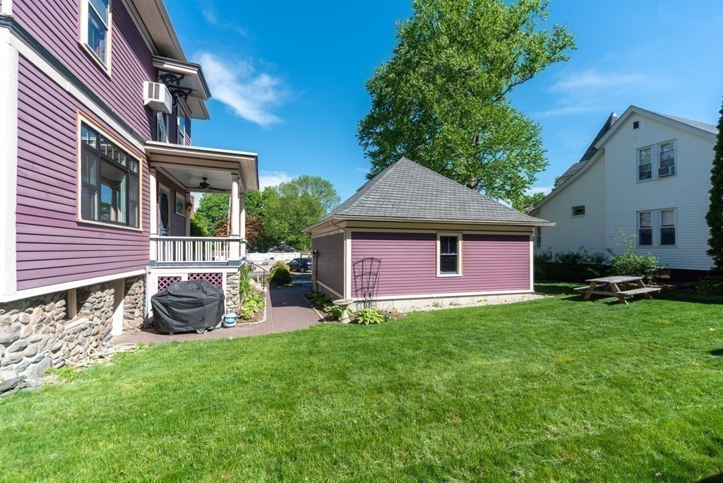 265 Water Street Clinton, MA 01510 - Photo 28 of 30 a front view of a house with a yard