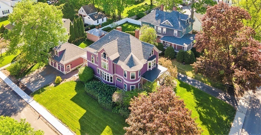 265 Water Street Clinton, MA 01510 - Photo 4 of 30 an aerial view of a house with a garden and swimming pool