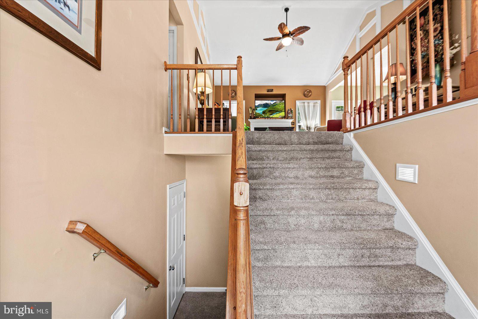 302 Forest Avenue Colonial Beach, VA 22443 - Photo 6 of 56 Stairwell going upstairs inside front door
