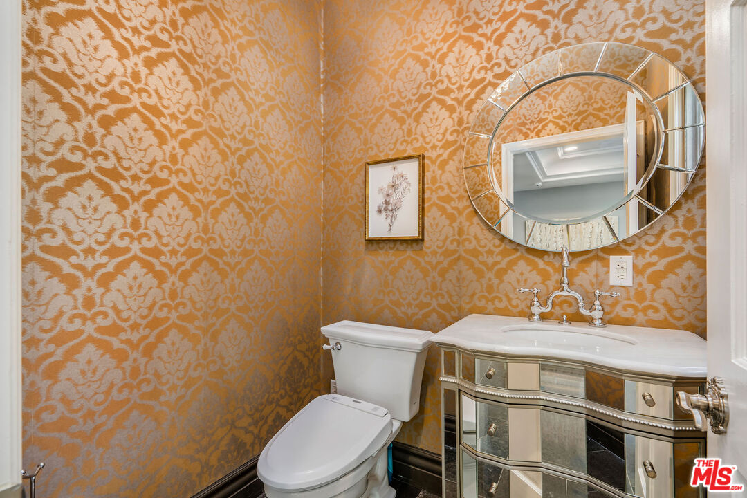 204 Bell Cyn Road Bell Canyon, CA 91307 - Photo 11 of 75 a bathroom with a toilet and a sink