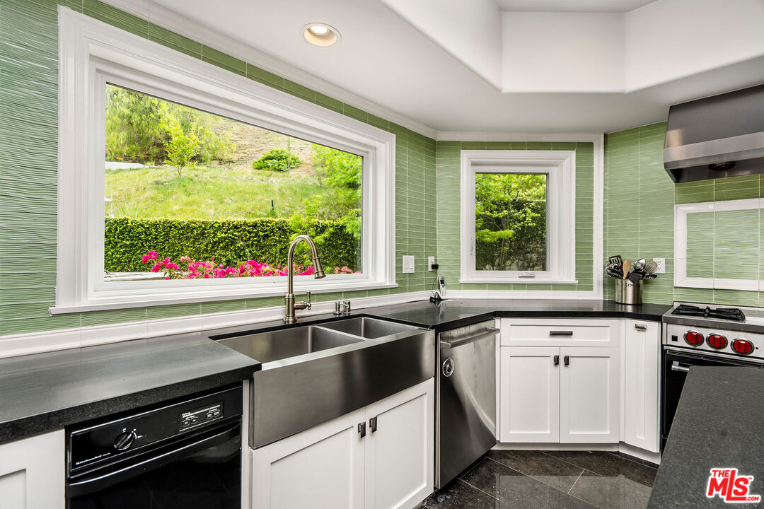 204 Bell Cyn Road Bell Canyon, CA 91307 - Photo 19 of 75 a kitchen that has a sink and a stove