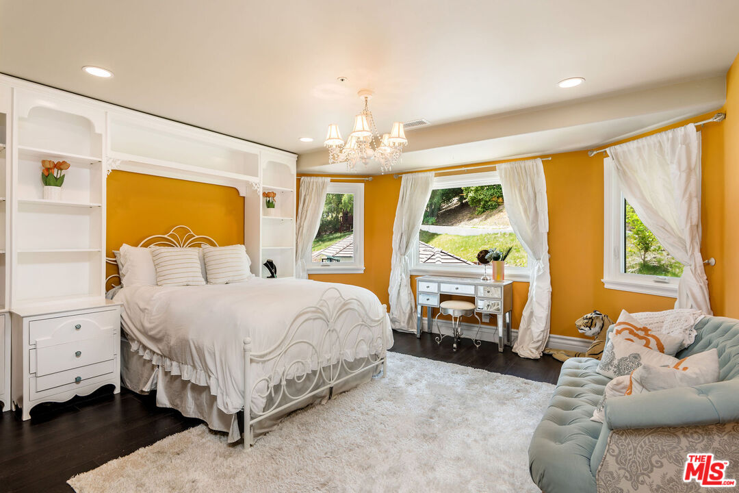 204 Bell Cyn Road Bell Canyon, CA 91307 - Photo 39 of 75 a spacious bedroom with a bed and large windows