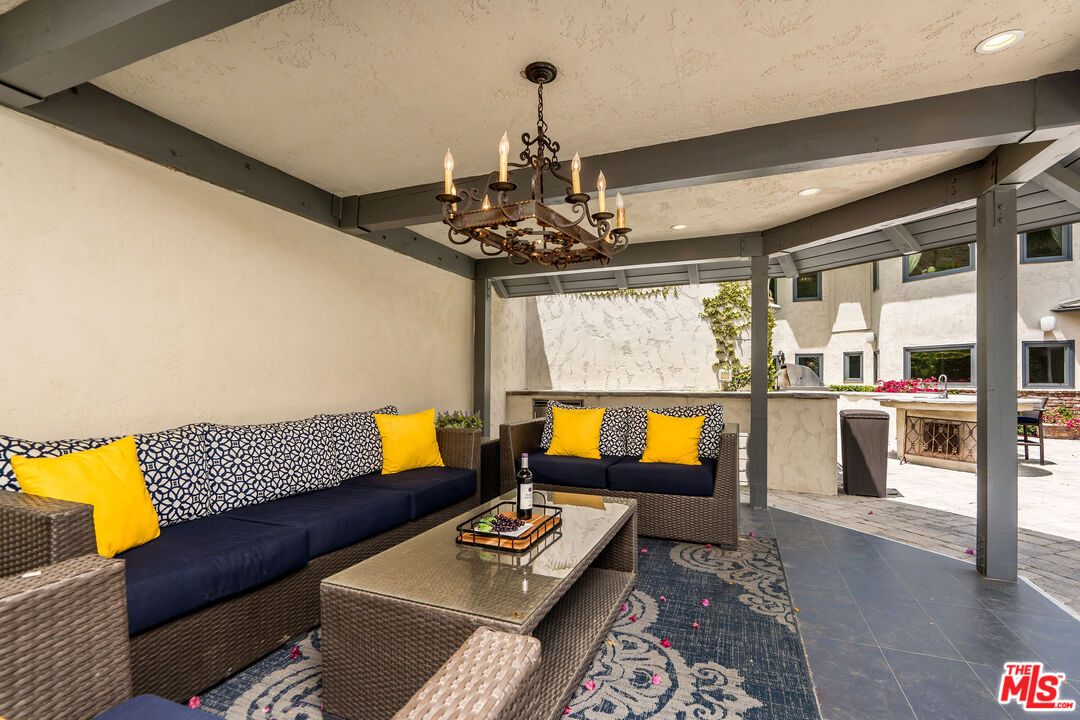 204 Bell Cyn Road Bell Canyon, CA 91307 - Photo 47 of 75 a living room with furniture and floor to ceiling window